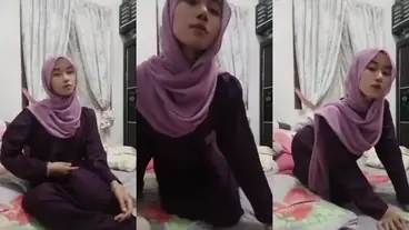 Ukhti Hijab Cantik Bersantai Di Kasur Pink